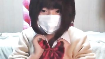 Pequeña japonesa adolescente spreads su apretado coño en cam (Casero)